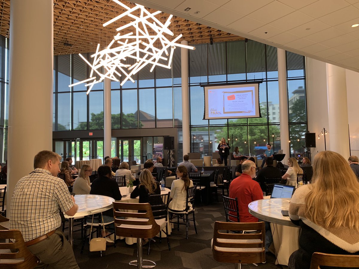 IAVMRegion6's tweet photo. Dueling sessions for round four & five! Inside @walton_arts theatre, #IAVMRegion6 attendees are chatting about best practices for zero waste events ♻️ & out in the atrium, attendees are learning all about maximizing organic social media exposure 📱 #BlazeYourTrail https://t.co/unGX1HE6IX