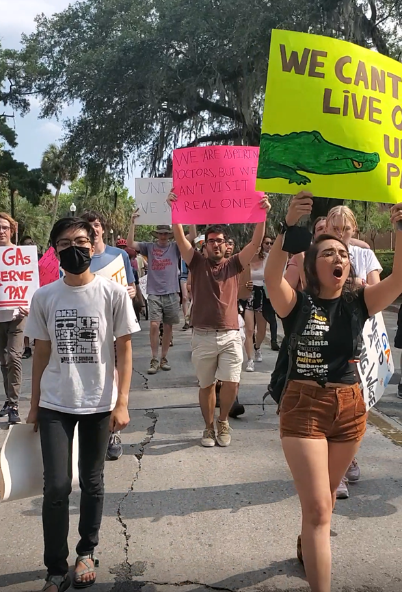uf_gau's tweet photo. THANK YOU to everyone who stood with UF graduate assistants yesterday against starvation wages! UF knows now that we are NOT tired, we are READY to continue negotiating, and we will not stop until we get the livable minimum stipend we deserve. #Top5Pay https://t.co/pTxWVhd1uo