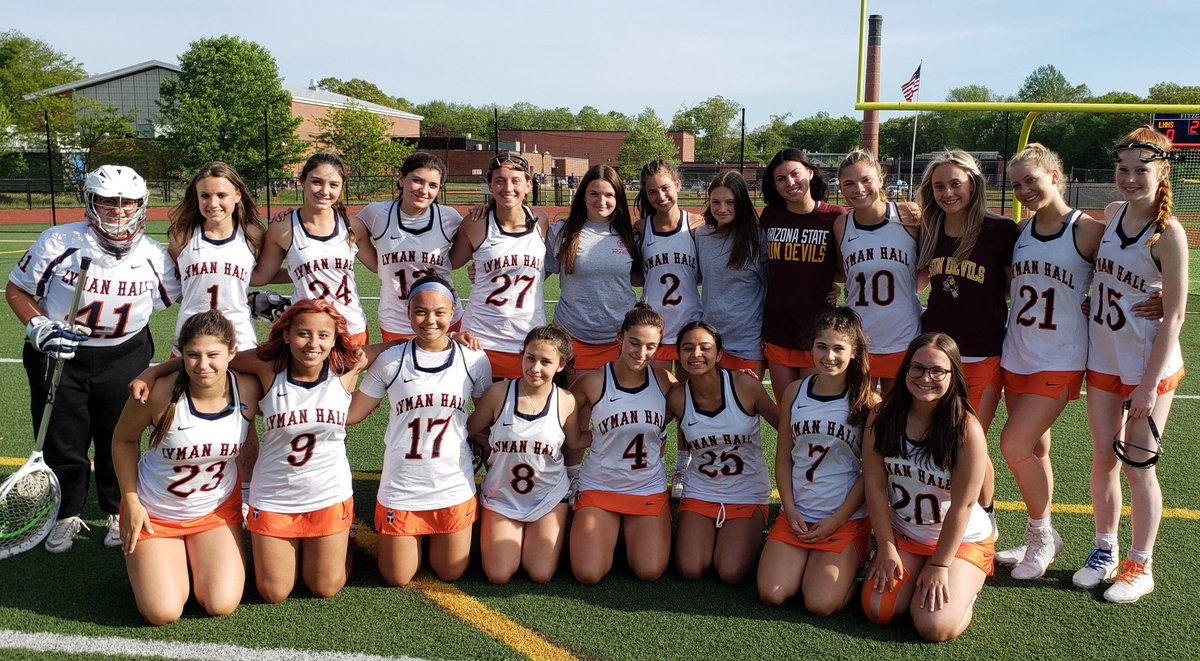 LHHSAthletics's tweet photo. Congratulations to our girls lacrosse seniors Liv and Lexi as they're surrounded and supported by their teammates. https://t.co/FNWNrXT7oH