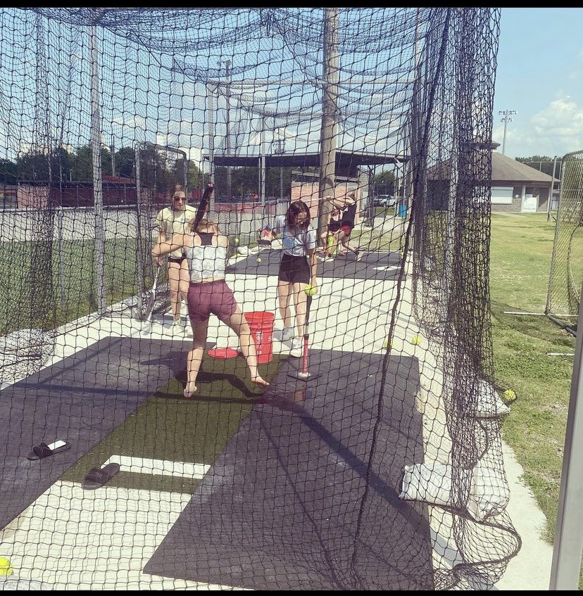 The coaches went by the field to put some gear up. The girls were there. Wasting no time to put in work for next season.