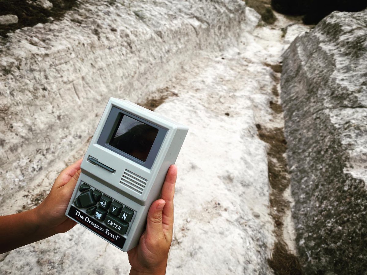 Throw back to when my kid humored me and agreed to play #oregontrail on the Oregon Trail ruts in Wyoming #immersiveexperience #mixedreality #xr