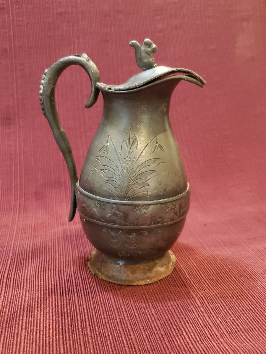 atticesoterica's tweet photo. Vintage Meriden Silver Plate Company Hinged Lidded Syrup Metal Pitcher (1353) Nature Motif With Squirrel Eating A Nut On Top Quadruple Plate https://t.co/Yf8SW2WrPk #BestOffer #Curios #Etsy #AtticEsoterica #Collectibles #Vintage #Antiques #SyrupContainer https://t.co/H94aXfgt9C