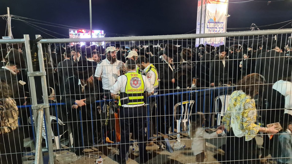 Mdais's tweet photo. Last night, MDA provided medical cover at the #MountMeron festivities with a massive deployment of #medical crews, including: 167 #ambulances, MICUs, helicopters, and more than 200 MDA professionals on foot. 

MDA closely coordinated with @israelpolice, @102_IL and the @IDF https://t.co/P3UC1izfRY