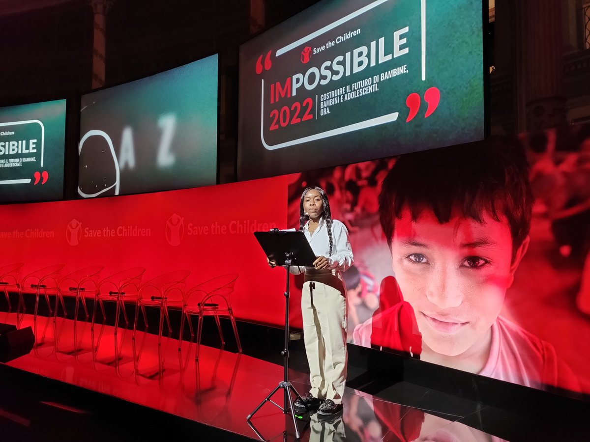 SaveChildrenIT's tweet photo. Hannah Imordi, studentessa del nostro #CivicoZero a #Catania condivide la sua testimonianza a #ImPossibile. Arrivata dopo 2 anni di viaggio tra sofferenze e violenze. Sembrava impossibile ma oggi sta realizzando i suoi desideri: "Il viaggio più lungo inizia con un passo". https://t.co/vXvfMzBL4D