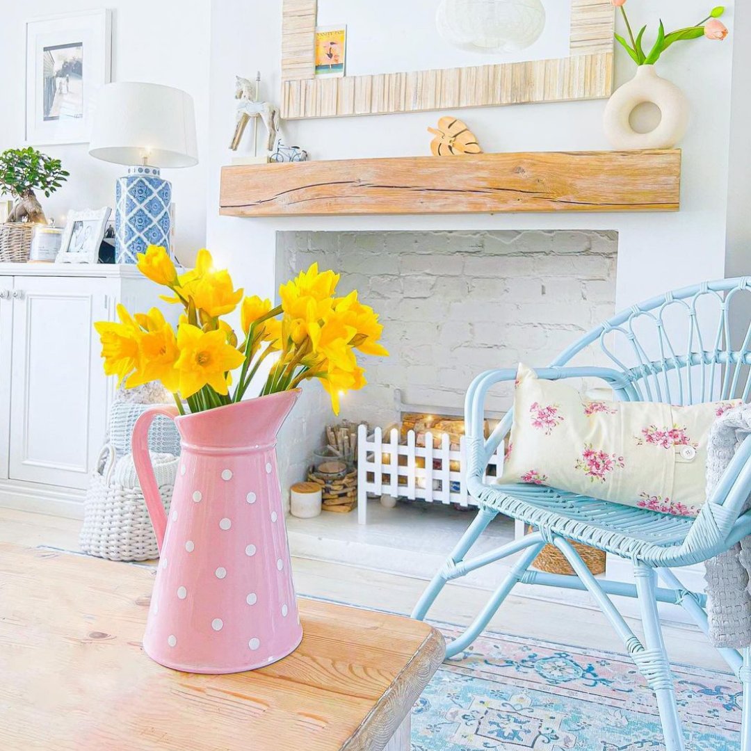 Cute, trendy and blue. Our little Nordic chair looks adorable in this living room. bit.ly/37VMHKn

#furniture #wickerfurniture