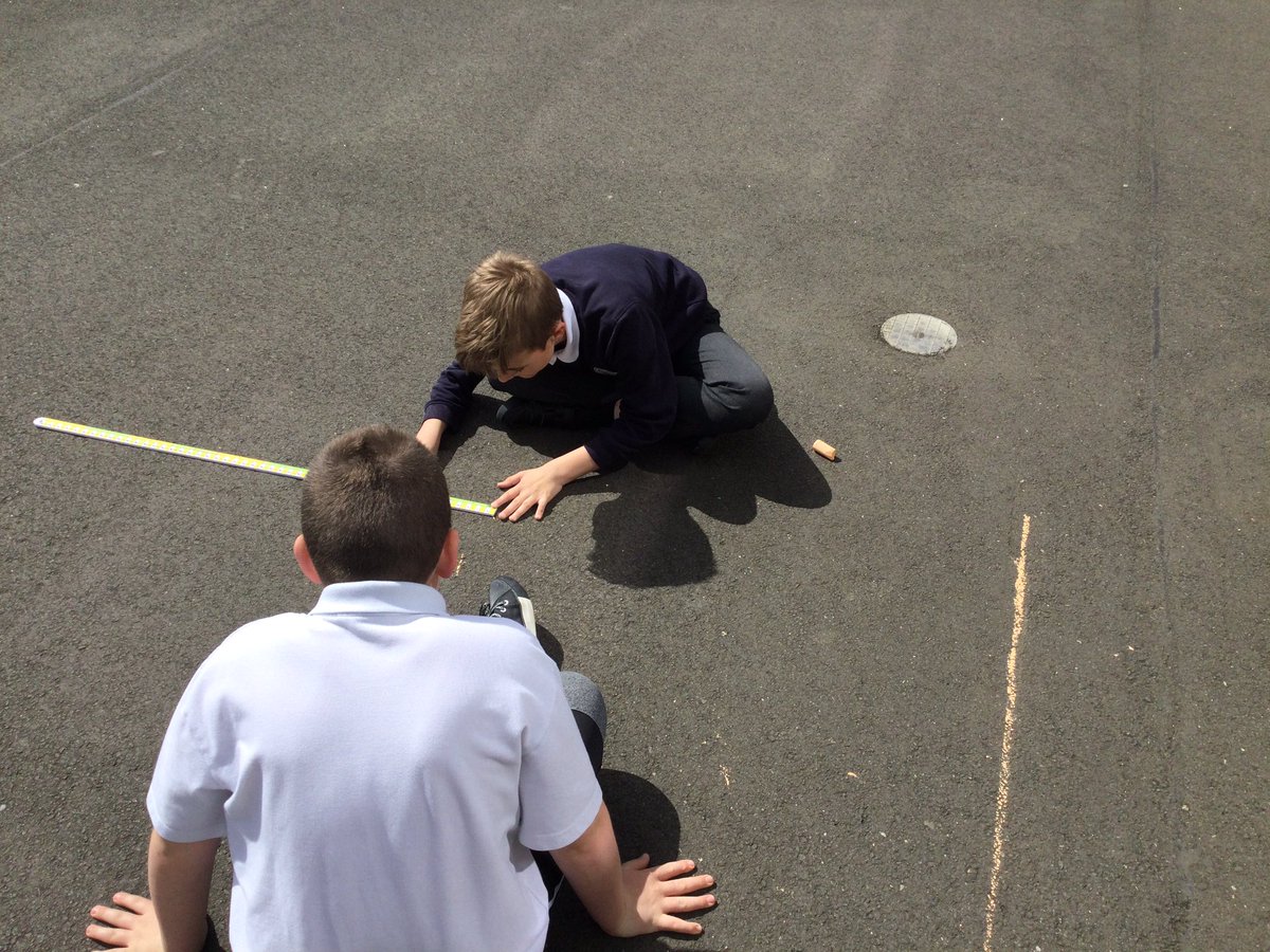 Measuring Standing Long Jumps in athletics today and enjoying a splash of sunshine!