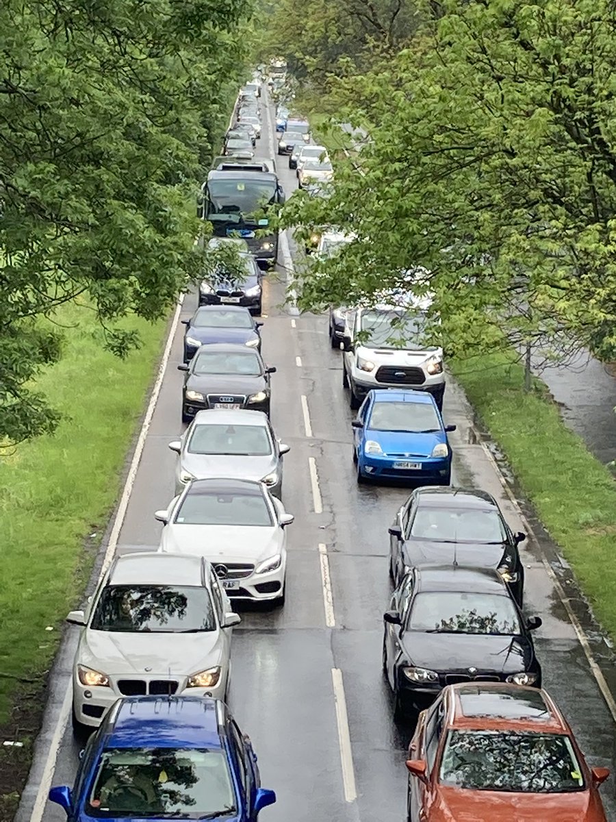 Nice to wizz past the queue of cars this morning. People moan that petrol is so expensive but here they sit - emitting deadly fumes. Why not go by bike?  Moaning that is was raining too? Consider that next time you have a drink of water! #11thhourforclimate #Fridaysforfuture