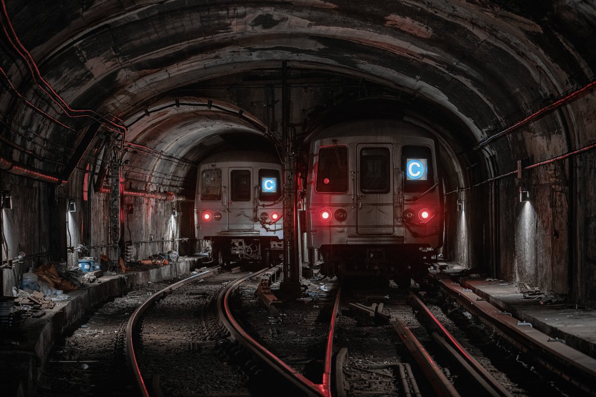 where the C train comes to rest after hours, the cavernous 174th St yard under NYC