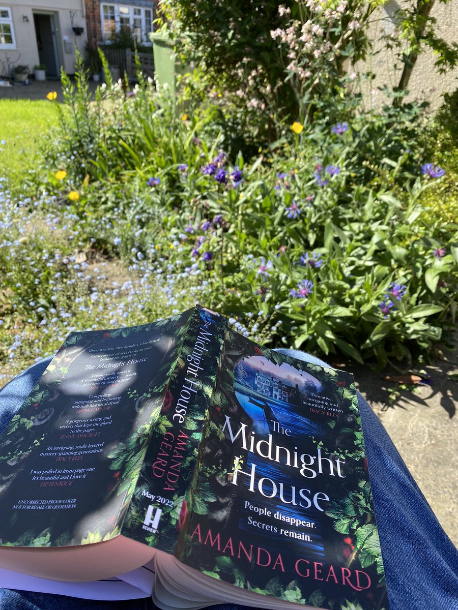 Enjoying my current read, out in the garden. #TheMidnightHouse @AmandaGeard