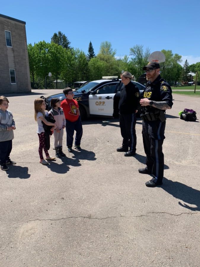 Our community OPP officers visiting with grade 1 and 2 classes.