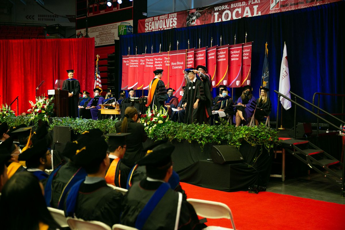 CEASSBU's tweet photo. Rob Kukta, Sr. Associate Dean in @CEASSBU, presents PhD candidates at the @stonybrooku hooding ceremony. Advisors, please hood your candidates! #SBUGrad #CEASconvocation #seawolvesforlife https://t.co/c6VE9eKQNh