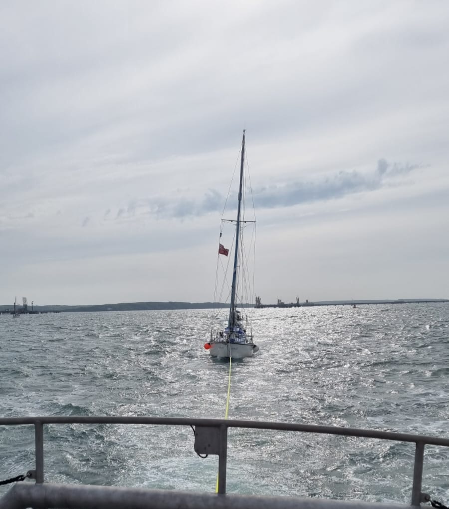 AngleLifeboat's tweet photo. HM Coastguard Dale  and an ambulance. The Lifeboat crew assisted the transfer of the casualty to the ambulance and headed back to station at 5:00pm.

The chocolate tub has been busy but is still well stocked! https://t.co/NtphivdbHR