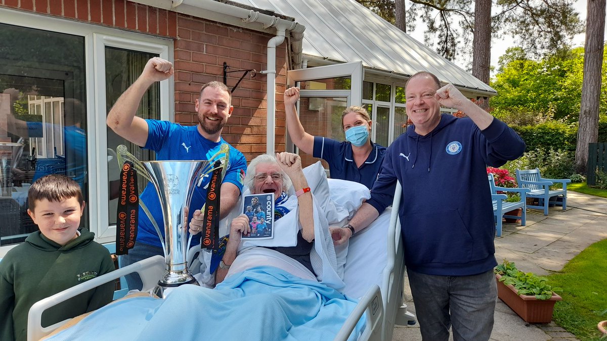 Stephen Foster's had the same seat at @StockportCounty since 1968. On the day they got promoted back to the Football League - he had to watch from his @StAnnsHospice bed. So they brought the trophy to him saying 'trophies are for the fans, they don’t belong in cabinets!' 👏👏👏