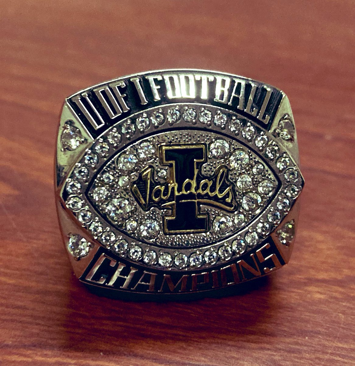 NMHUFootball's tweet photo. Does the coaching staff you're interested in playing for have a Potato Bowl ring? If not, maybe you should check out New Mexico Highlands University.
#D2Ball #LetsRide #ClimbTheMountain https://t.co/nzm0sBsWWu