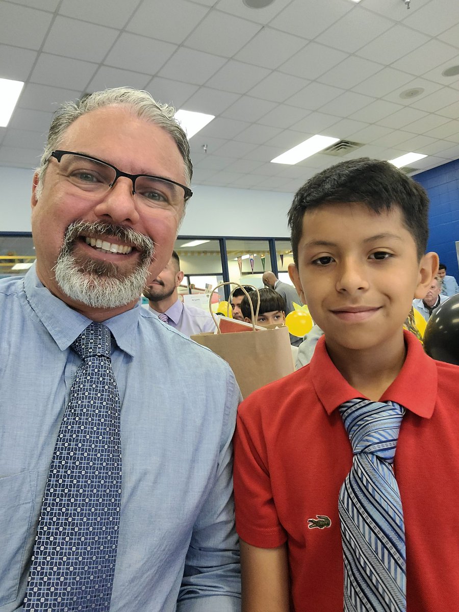 This morning, I had the honor of teaching Angel how to tie a tie <a href="/SchulzePanthers/">Schulze Elementary</a> "Ties with Guys!" I was impressed by the number of men from <a href="/IrvingISD/">Irving ISD</a> and the community that answered the call. #SiSePuede #lifelongskills