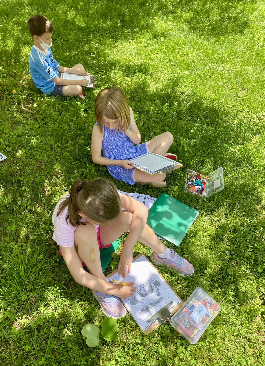 Writing our fiction stories outside and enjoying the weather. ☀️✏️