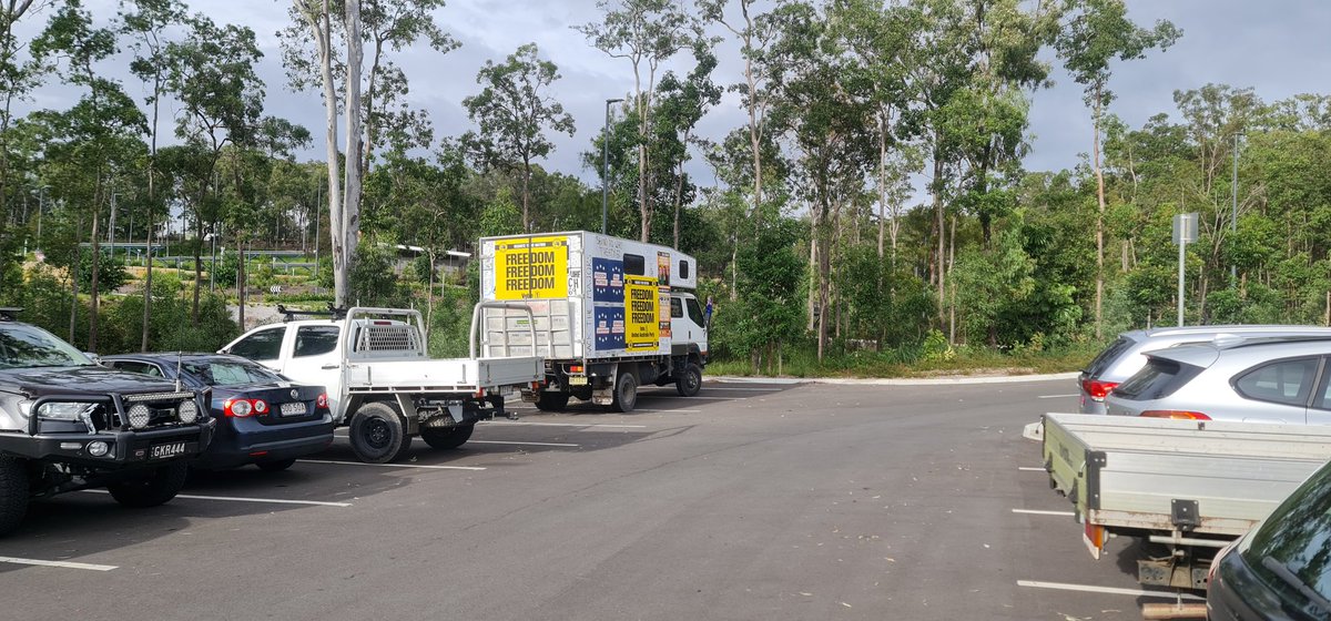 katf1982's tweet photo. @AusElectoralCom any reason why these parties have been permitted to break the AEC rules at Pimpama prepoll? No coreflutes beyond the entrance gate, however this truck is parked up near the booth covered in coreflutes #auspol #ausvotes https://t.co/Vk3lqi5Zi9