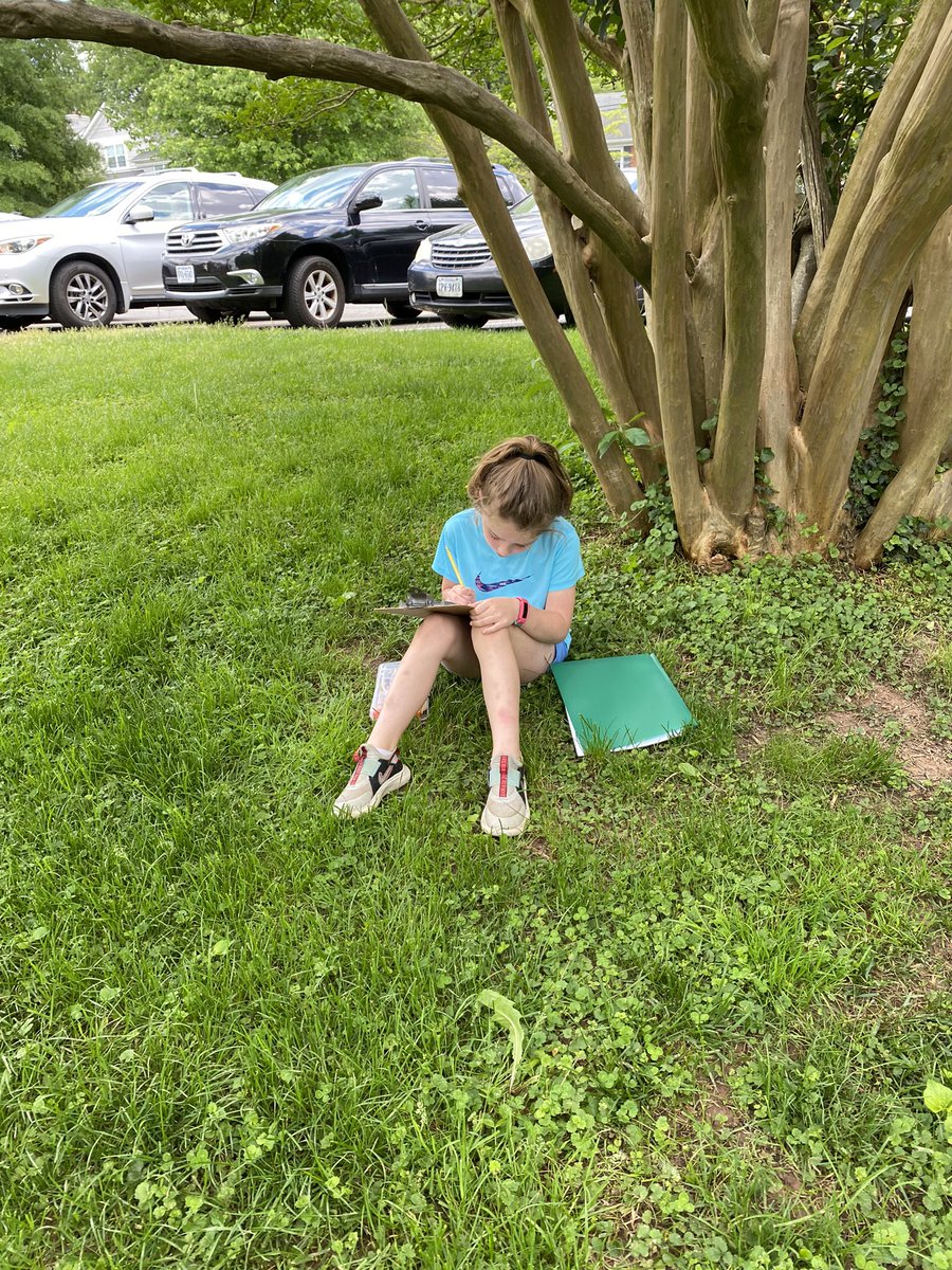 Writing our fiction stories outside and enjoying the weather. ☀️✏️