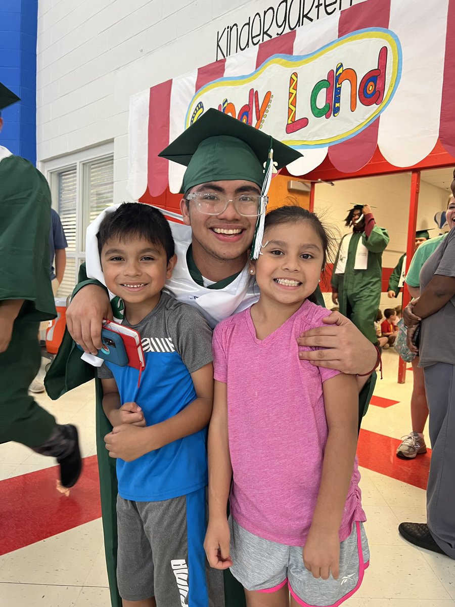 SherriCamp11's tweet photo. Graduation Walk at LCES. A few of my EL babies with their siblings. @DCSELDepartment @TweetDCS_LCES https://t.co/gxW7KpUALa