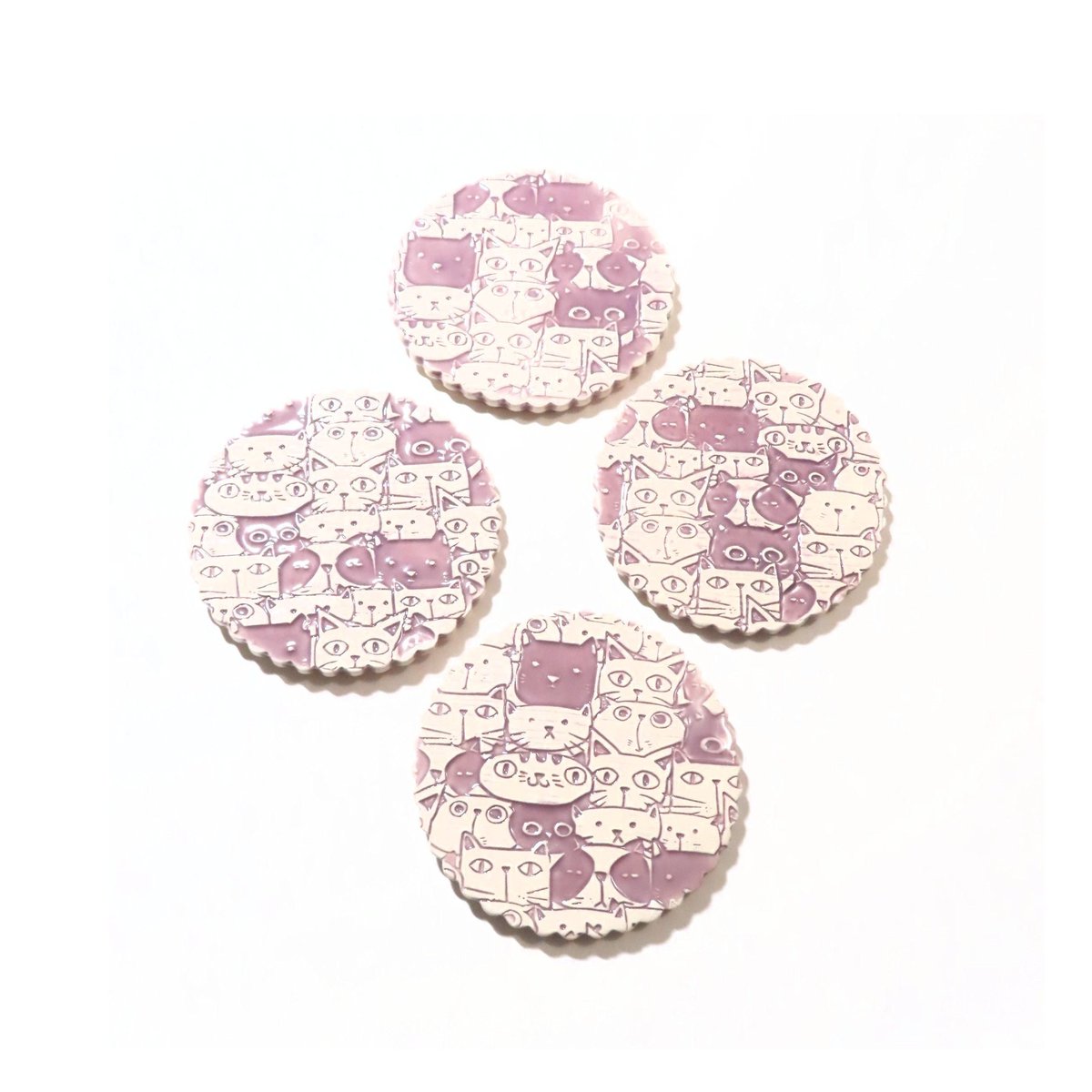 JKCJewelry's tweet photo. Fun Cat Purple Coaster, Feline Ceramic Coaster, Handmade Drink Holder, Kitty Gift, Non Slip Pottery Coaster, Cat Lover, Gift Idea, Set of 4 https://t.co/kNPY8IoLmj #CeramicCoaster https://t.co/XxaLXTPcze