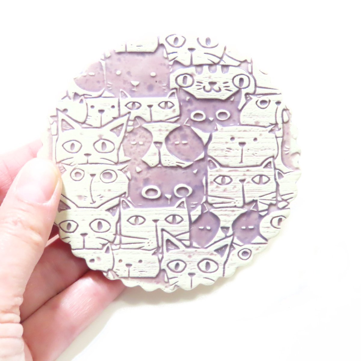 JKCJewelry's tweet photo. Fun Cat Purple Coaster, Feline Ceramic Coaster, Handmade Drink Holder, Kitty Gift, Non Slip Pottery Coaster, Cat Lover, Gift Idea, Set of 4 https://t.co/kNPY8IoLmj #CeramicCoaster https://t.co/XxaLXTPcze