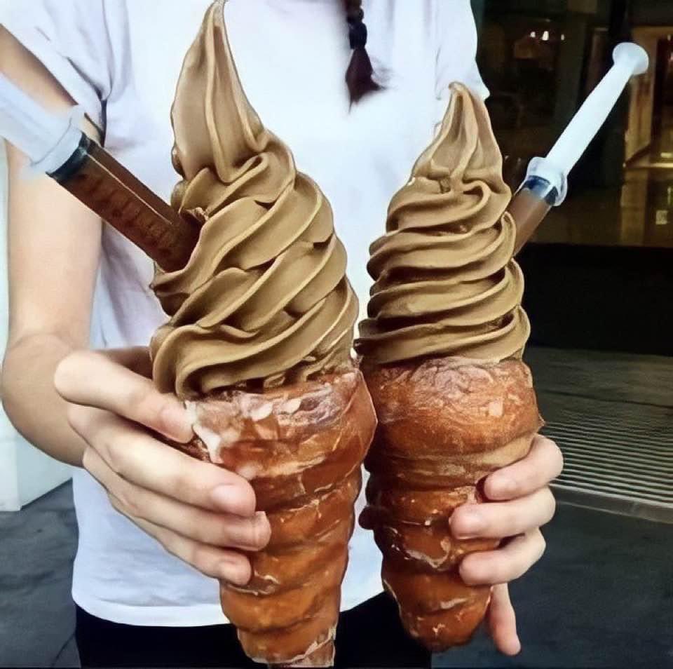 Judianna's tweet image. Coffee ice cream with a shot of espresso in a donut cone.