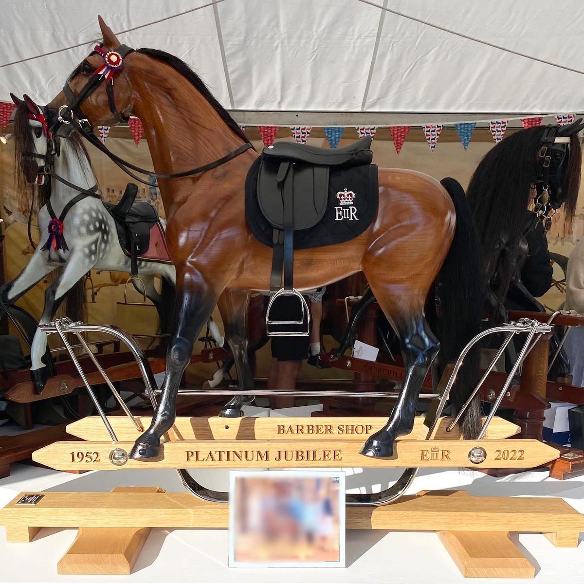 horseandhound's tweet image. ‘70 years of fabulous reign’: rocking horse replica of Barbers Shop presented to The Queen trib.al/CgIc2B8