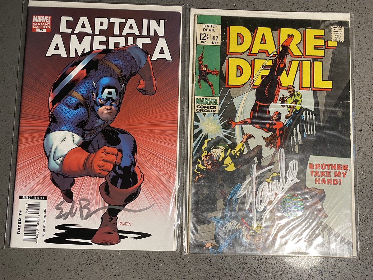 Found these two when I pulled my long boxes from storage. Captain America #25 (death of Cap) signed by Ed Brubaker and Daredevil #47 signed by Stan Lee.