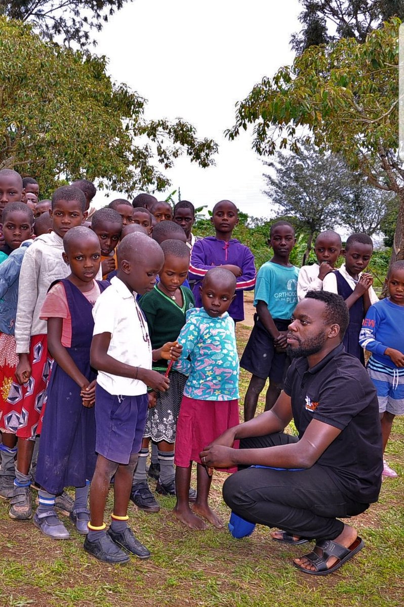 Our Founder, Fredrick Ims Kayiira interacting with the #PEIS Child Education Insurance Scheme beneficiaries at Kifukamiza Primary School in Kyotera district. The innovation empowers parents to meet their Children's Education needs, succeed and stay in School.