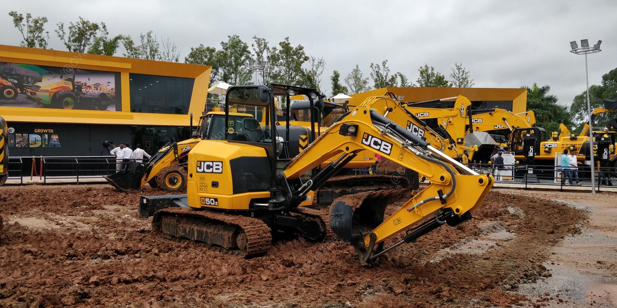 CVmagazine's tweet photo. A practical set-up where CEV were in action, and one of the largest out door stall was of JCB
- They also launched various products one of them was the 19C-EV an electric mini excavator 
@JCBIndiaLtd @JCBmachines @CII_Excon 
#OneWithIndia #JCB #ExCon #excon2022 #excon2k21 https://t.co/Op35cYLYHl