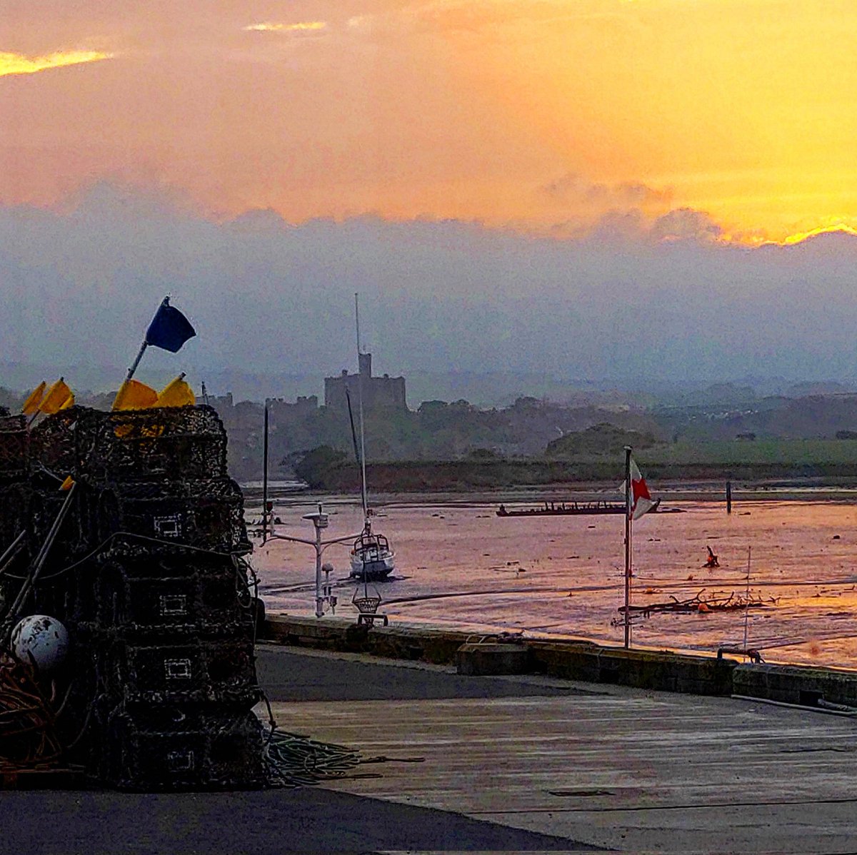 StablesGraham's tweet photo. Northumberland Sunsets over Amble with Warkworth Castle in the background #NORTHUMBERLAND #Amble #Walkworth https://t.co/BZVorurJkk
