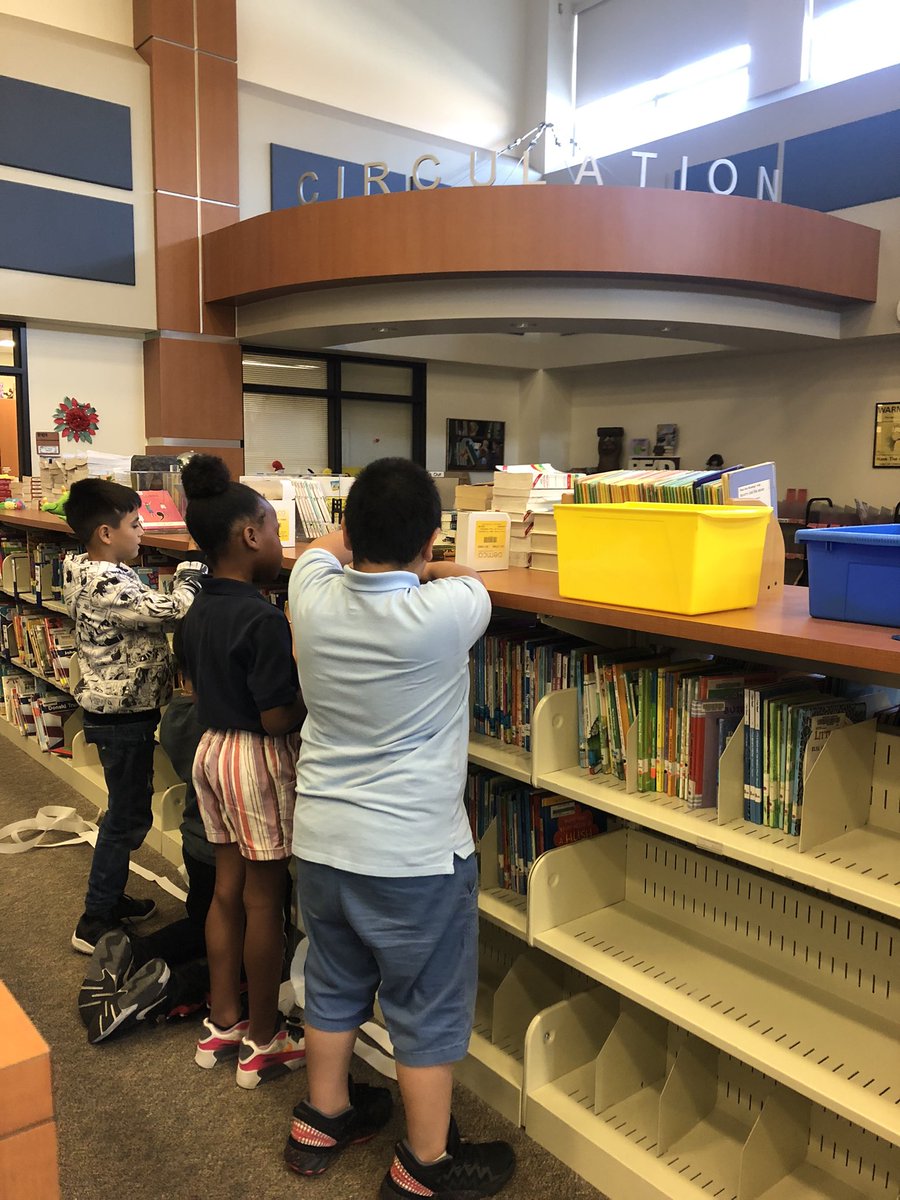 Library_SBE's tweet photo. 2nd grade @SBEBears working hard to get our library ready for next year. https://t.co/fOLExSEUpN