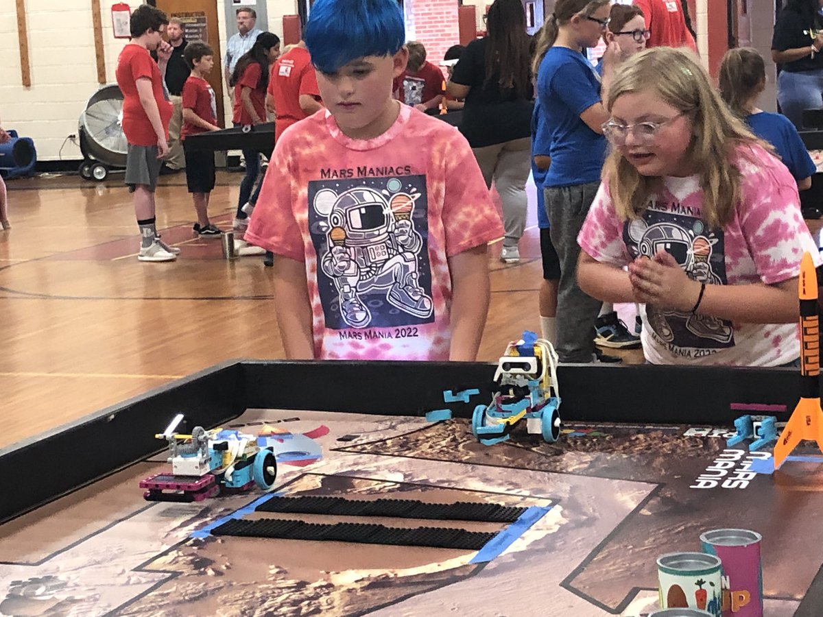 Robotics teams actively engaged in their missions during RoboDavidson @Dcsnc