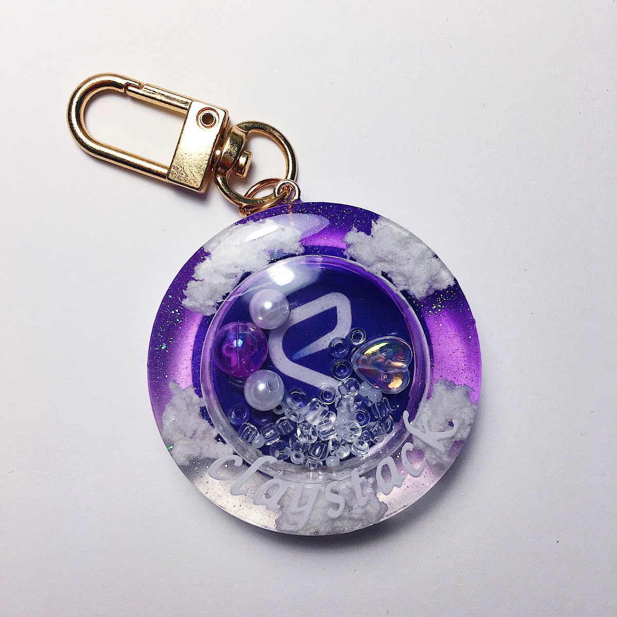 PradtanaTP's tweet photo. I made a @ClayStack_HQ resin keychain with purple galaxy and cloud.

#ClayClan #StakingReDeFined
#DeFi #ClayStackArts
#ClayStackHobbies https://t.co/2acVIc1Zqo
