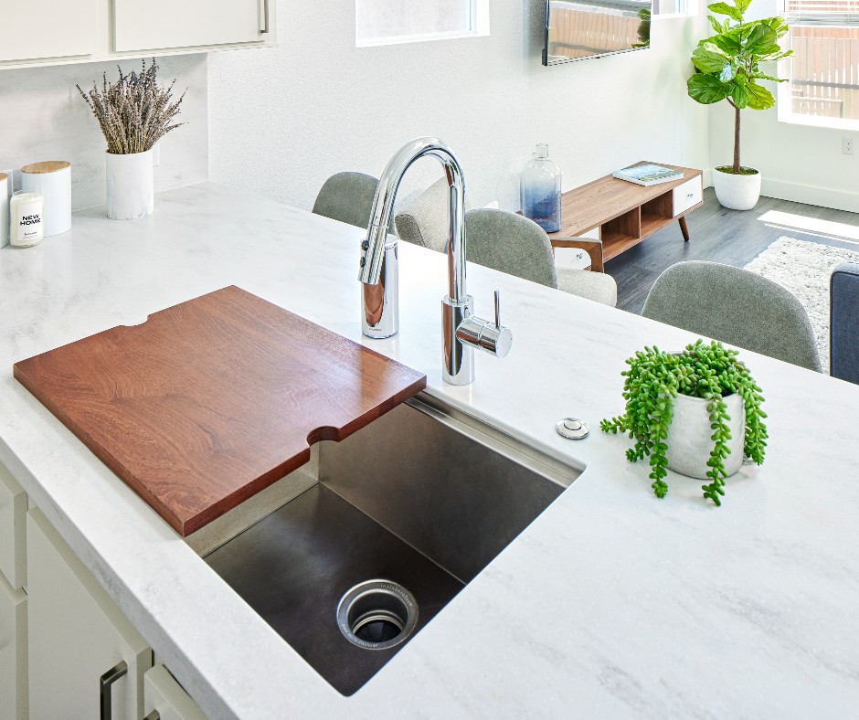 uniteddwelling's tweet photo. With sleek lines and elegant lighting, we design our #ADU kitchens with both style and sustainability in mind! 💚 And unlike other builders, our backyard guest houses come fully equipped with appliances! Schedule a FREE consultation >> https://t.co/4QsEcApyeN https://t.co/Y1gqwbJbZi