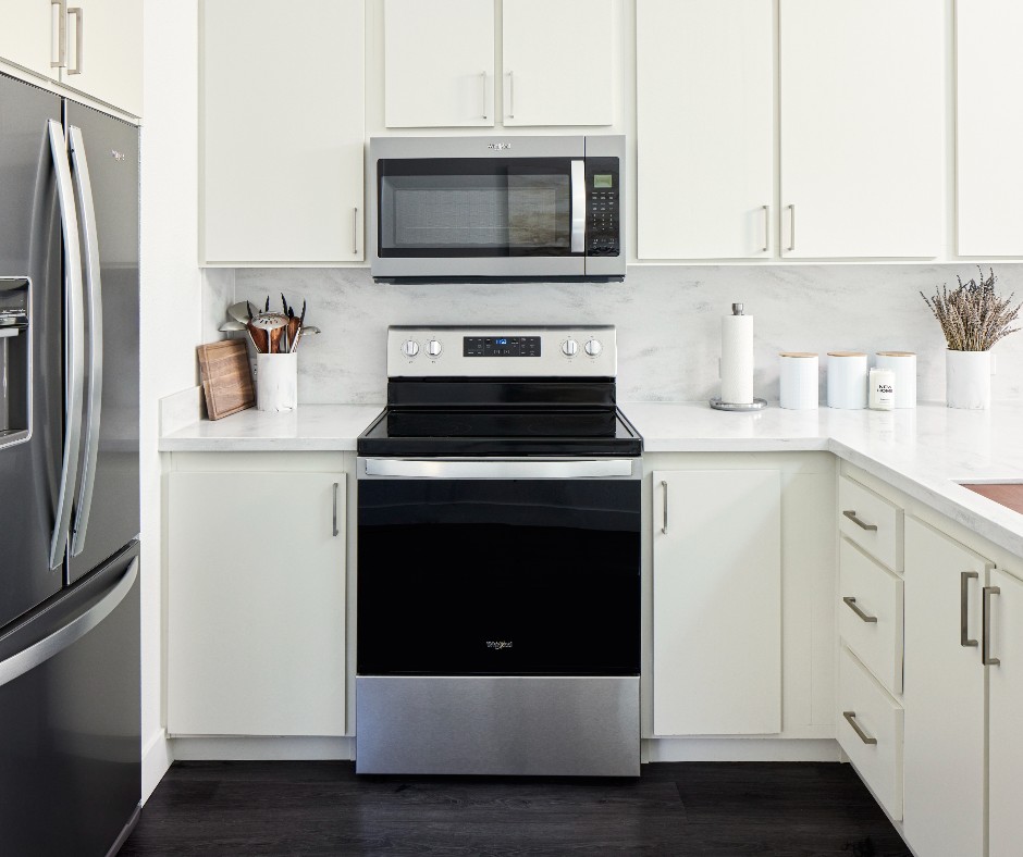 uniteddwelling's tweet photo. With sleek lines and elegant lighting, we design our #ADU kitchens with both style and sustainability in mind! 💚 And unlike other builders, our backyard guest houses come fully equipped with appliances! Schedule a FREE consultation >> https://t.co/4QsEcApyeN https://t.co/Y1gqwbJbZi