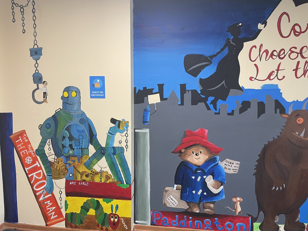 DeputyMrBourke's tweet photo. When the children have gone home for the day… sometimes, I paint 🎨 

Which character should I add next? 

#librarymural #libraryart https://t.co/ljeX8pe5Dx