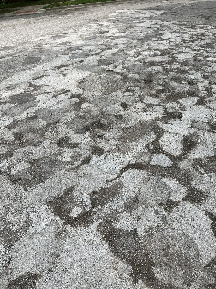 DougTribou's tweet photo. When I see this type of street repair, I like to imagine it’s inspired by the drip paintings of Jackson Pollock. 

(This piece is on display at the Gallery of Ann Arbor’s Side Streets.)

#MichiganRoads https://t.co/qpCjWkVqS9
