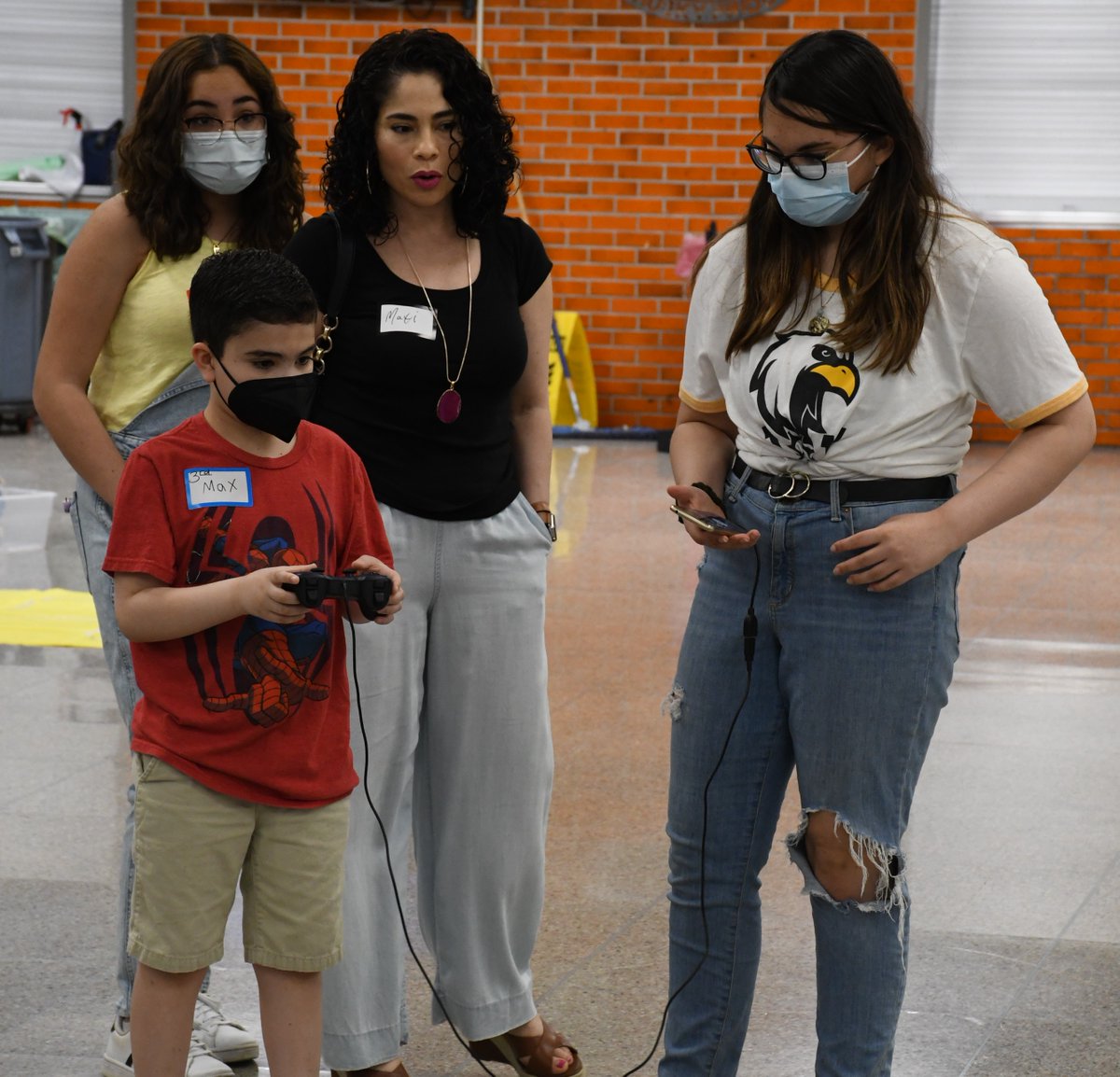 bps271's tweet photo. New Code Academy’s Family Computer Science night brought online students and families together in-person for hands-on robotics challenges, 3D printing, creative computing and community-building. #CSinBPS @CSinBPS https://t.co/UeDaHBISDf