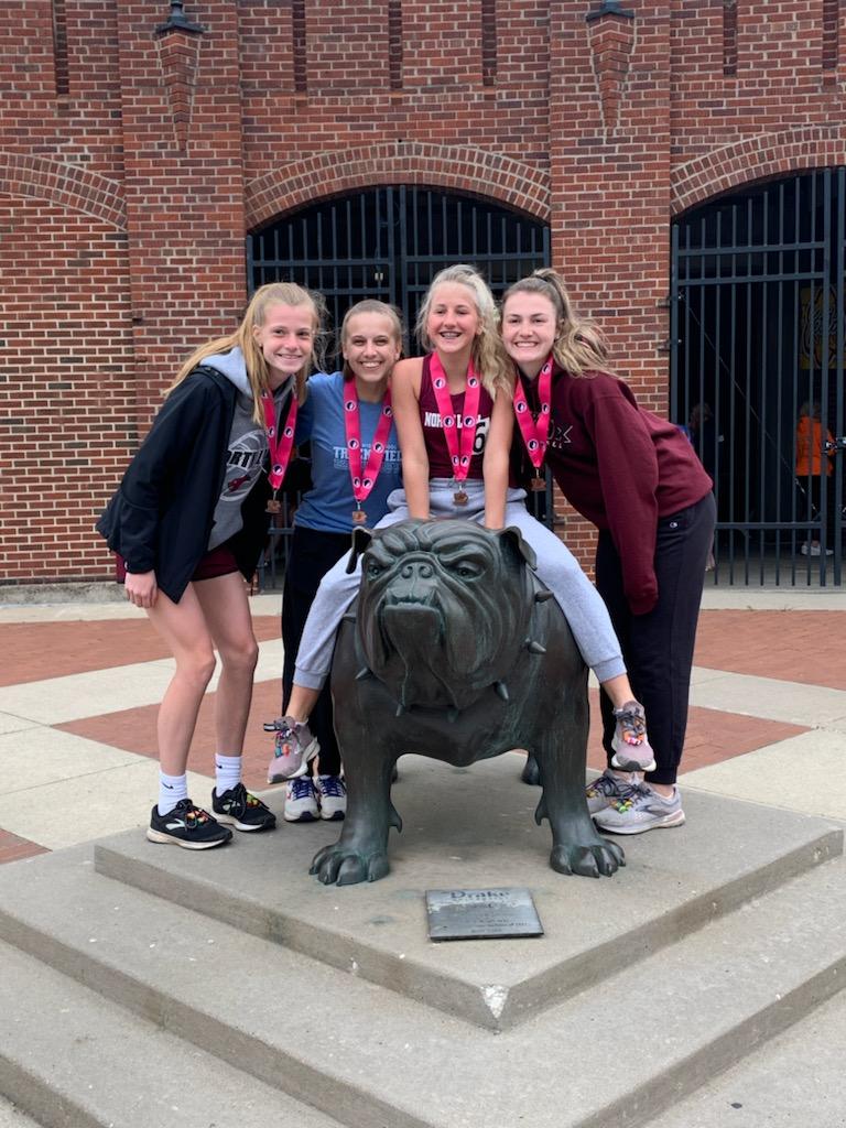 Congratulations to the  North Linn Girls' Dmed team for placing 8th at the State Meet and running a new PR! #NLTF