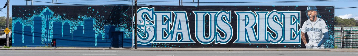 zachleft's tweet image. A #SeaUsRise mural has popped up in SoDo