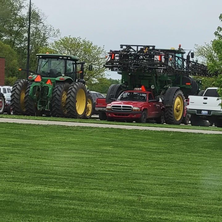 Coach_Pfiester's tweet photo. If your school parking lot looks like this there is a 100% chance that you Power Clean in Wt. Training and a 0% chance you run the Air Raid. https://t.co/GGenFkBXL3