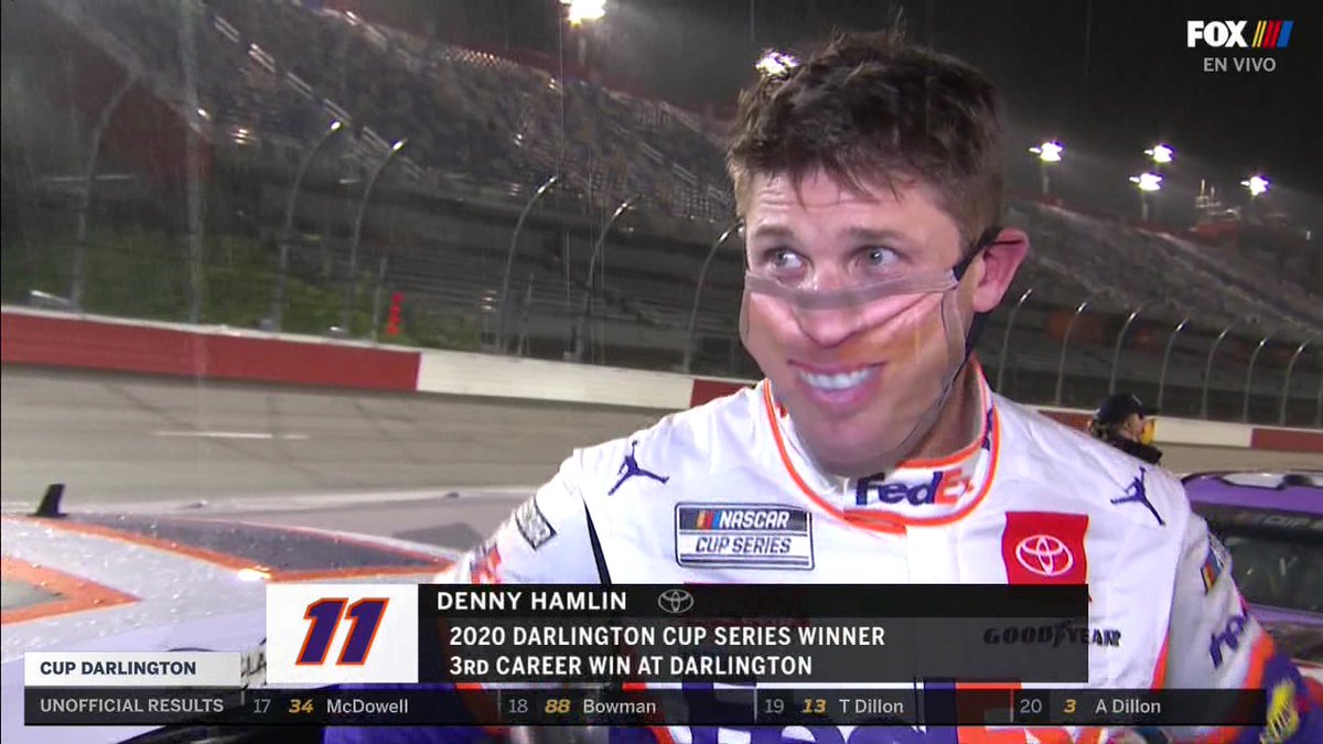Denny Hamlin wins at Darlington. he is wearing a mask that has his own face on it. it is disturbing