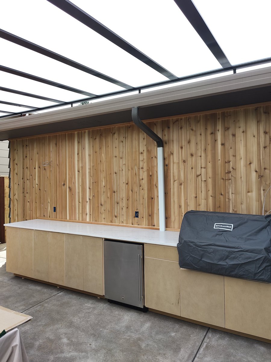 Cedar T&amp;G wall.  A nice backdrop for the cabinets and counter
.
.
.
.
.
#carpenterguynw #outdoorlivingspace #outdoorliving #patiodesign #cedar #greatideas #portlandoregon #spring2022 #callus #carpenter #love #home #design #vancouver