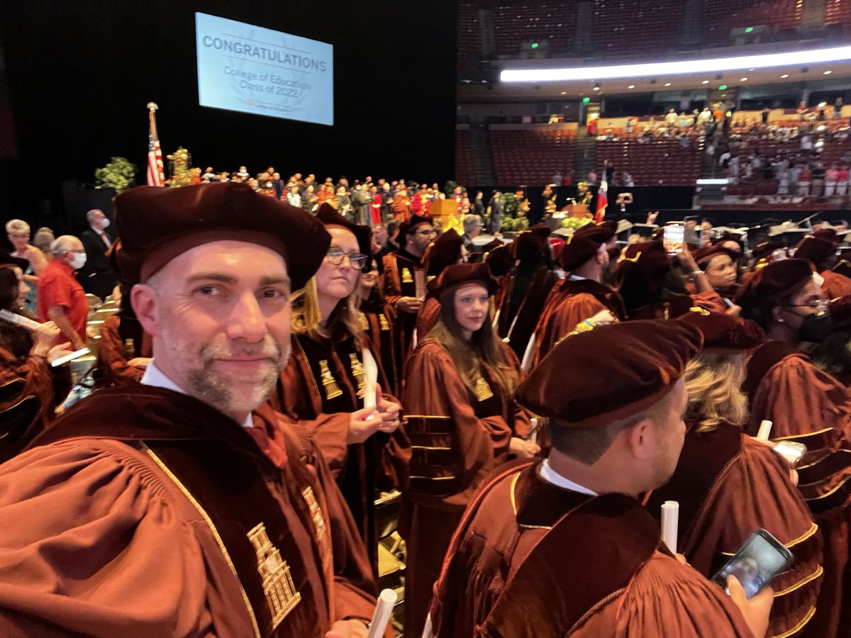 DrBinnicker's tweet photo. 30 yrs ago I watched my dad walk the stage earning his bachelor’s degree. Yesterday I sat in the same place at the @ErwinCenter and I got to walk the stage for my doctorate as my boys watched. My @utexascoe journey has come full circle. “Who starts here changes the world.” #CSP29 https://t.co/pd22Jh8D5P
