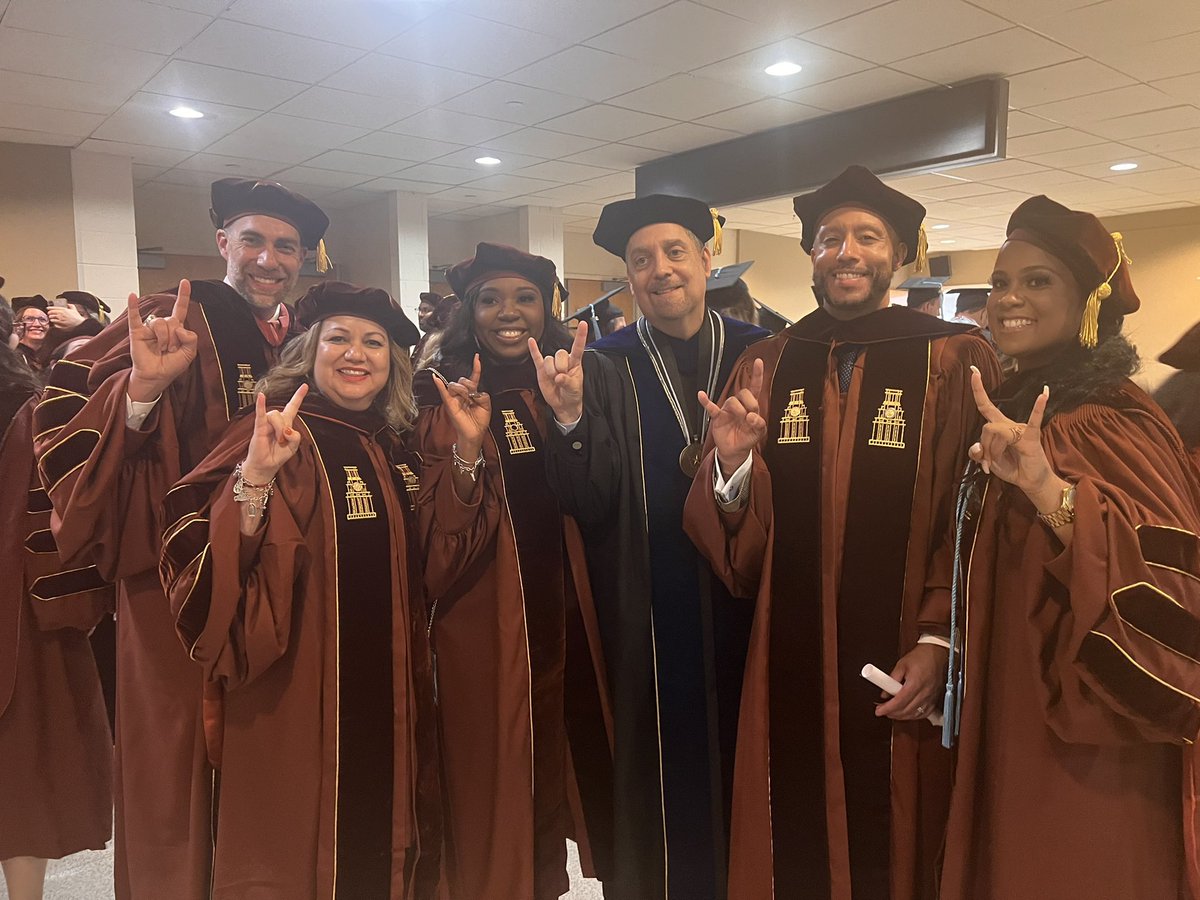 DrBinnicker's tweet photo. 30 yrs ago I watched my dad walk the stage earning his bachelor’s degree. Yesterday I sat in the same place at the @ErwinCenter and I got to walk the stage for my doctorate as my boys watched. My @utexascoe journey has come full circle. “Who starts here changes the world.” #CSP29 https://t.co/pd22Jh8D5P