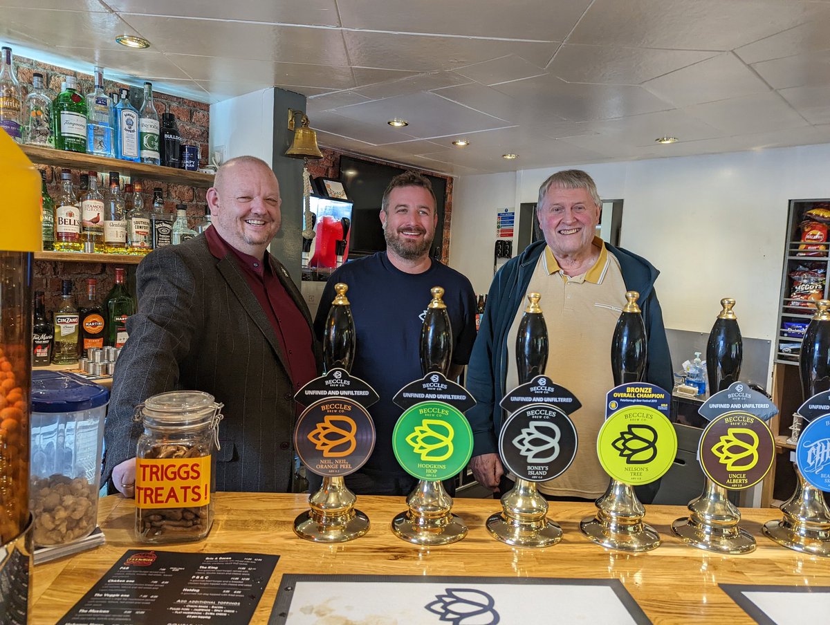 Pub of the Year presentation to Butchers Arms. Photo features landlord Ian, brewer Adam and Branch Chairman Mike.