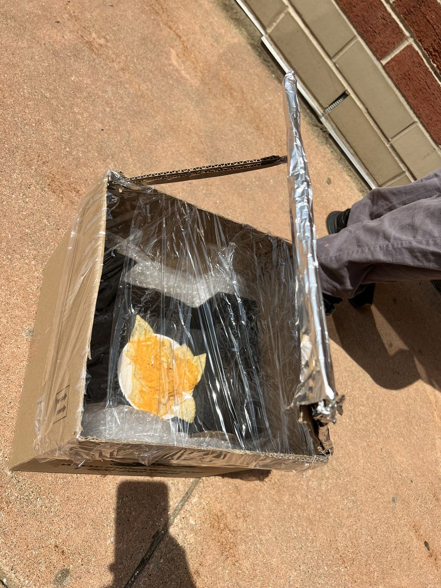 Mrs_Simoni's tweet photo. Solar cooker test day! Environmental Science students had to research, design, and make a solar cooker that they could cook with.  We tested their designs making nachos. #survivalskills #usingthesunforcooking @SBRileyhigh https://t.co/DUK3ids0BJ
