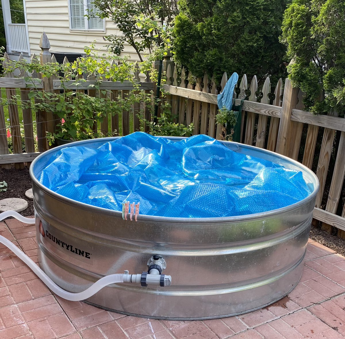 edgeofempty's tweet photo. At my computer now studying for the #BarExam, so later I can work on finishing the opening of our #StockTankPool from @TractorSupply for year 2 of summer cooling. https://t.co/Ngg39izBAY