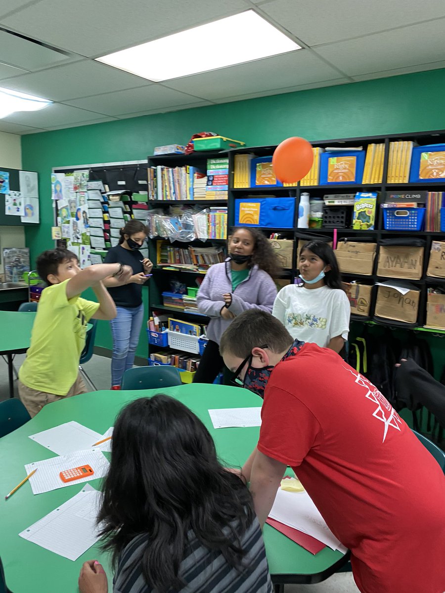 MsDunnHopper's tweet photo. Math Gauntlet day 3: Focusing on solving the problem while others juggled a balloon. #SOLReview #5thGrade #OCES #Maths #MakeItFun #o_braves @OccoquanES https://t.co/Zw24pZ5Ipv